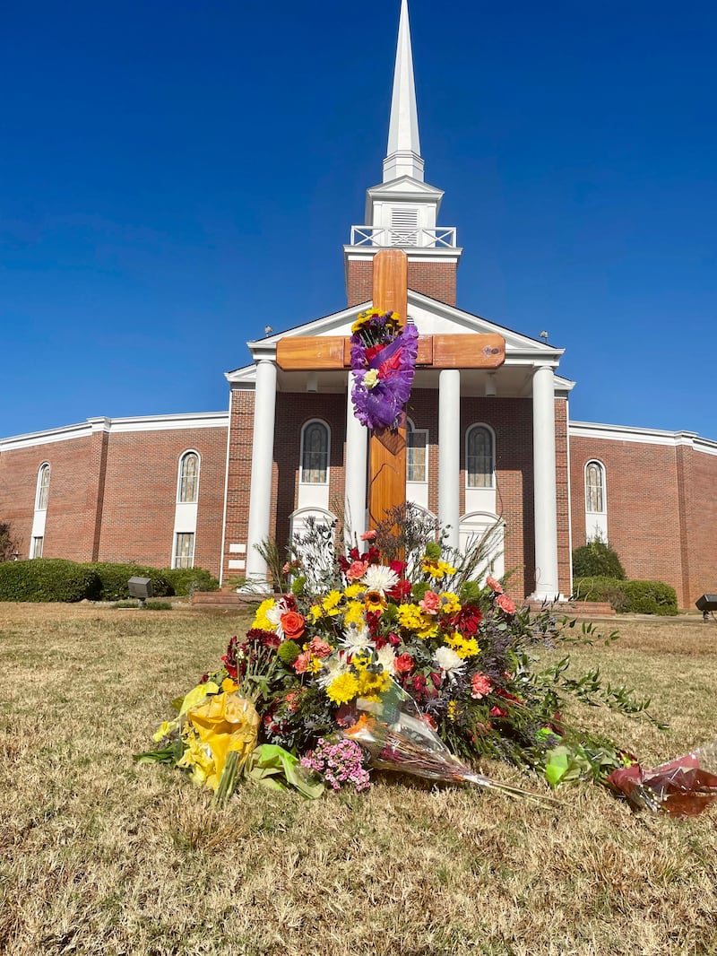 A photograph of flowers sitting in a memorial to Bubba Copeland outside First Baptist Church in Phenix City, Ala., on Nov. 5, 2023.