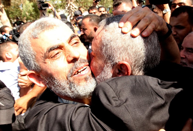 Al-Sinwar is hugged by senior Hamas leader Ismail Haniye