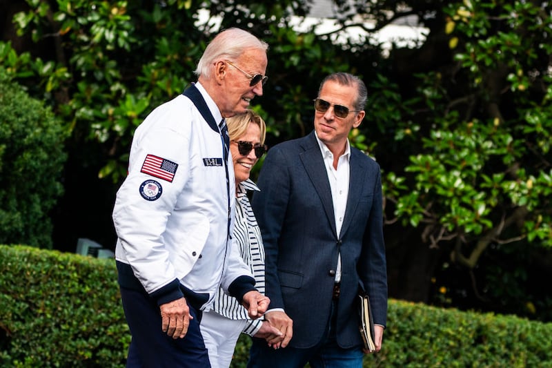 President Joe Biden, his sister Valerie Biden, and his son Hunter Biden make their way to Marine One on the South Lawn of the White House.