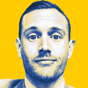 A picture of journalist Josh Kruger against a yellow background.