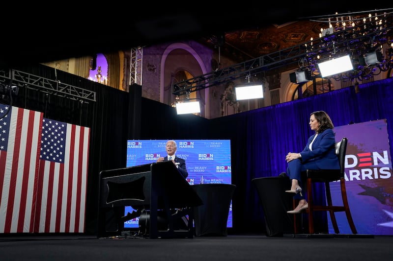 Biden and Harris sit together in a virtual studio in Delaware 