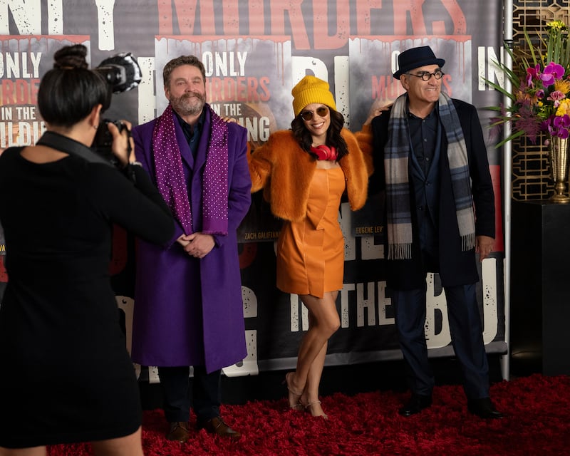 Zach Galifianakis, Eva Longoria, and Eugene Levy in character on Only Murders set.