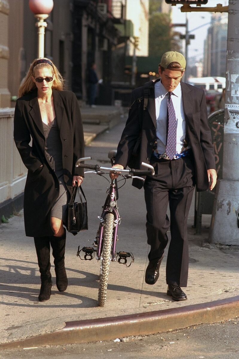 John F; Kennedy Jr. and Carolyn Bessette-Kennedy are pictured on a walk in Downtown New York in October 23, 1996.