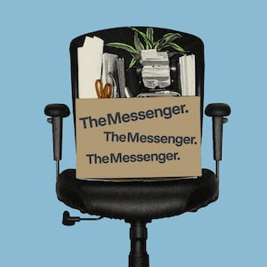 A chair topped with a box filled with office items, reading “The Messenger.”