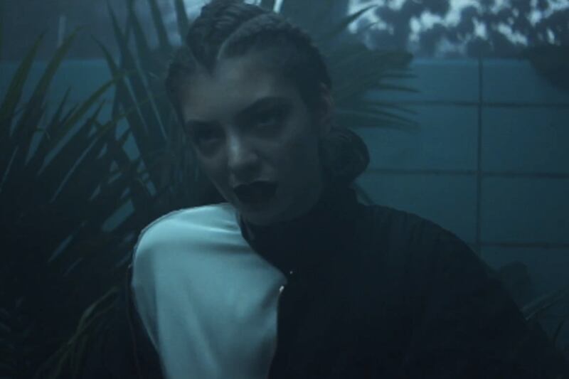 articles/2013/12/03/watch-lorde-s-magical-new-music-video-for-her-song-team/131203-stern-lorde-tease_rgt76m