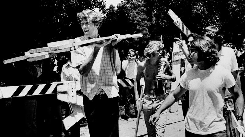 A photo including Bill Walton outside the administration building of the UCLA campus in Los Angeles