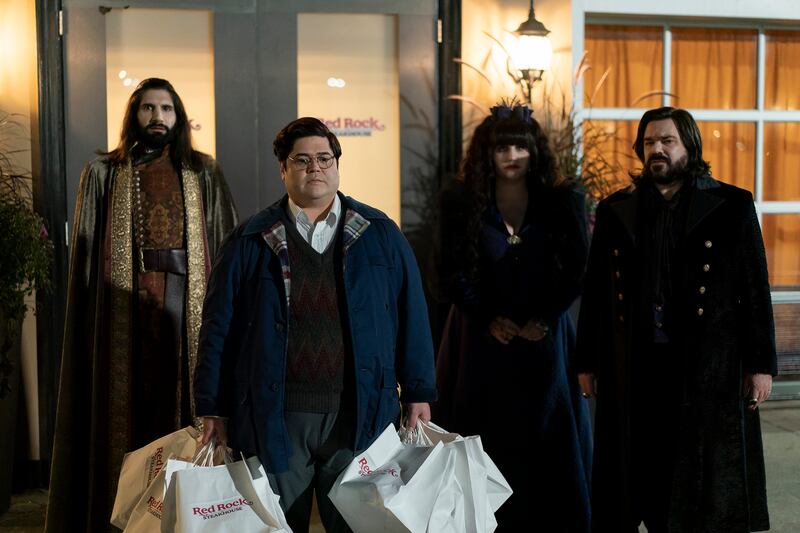 An image of Kayvan Novak, Harvey Guillén, Natasia Demetriou, and Matt Berry in What We Do in the Shadows.