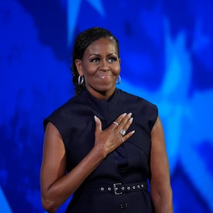 Former U.S. first lady Michelle Obama takes the stage during Day 2 of the Democratic National Convention (DNC) in Chicago, Illinois, U.S., August 20, 2024.