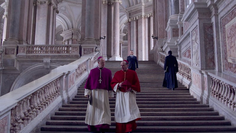 Brían F. O'Byrne as Cardinal O'Malley with Ralph Fiennes