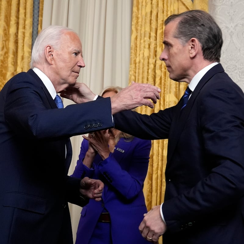 President Joe Biden hugs son Hunter Biden after addressing the nation from the Oval Office of the White House on July 24, 2024 in Washington, DC.