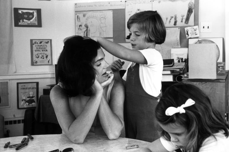 galleries/2013/07/26/caroline-kennedy-through-the-years-photos/caroline-playing-with-hair_kdxutx