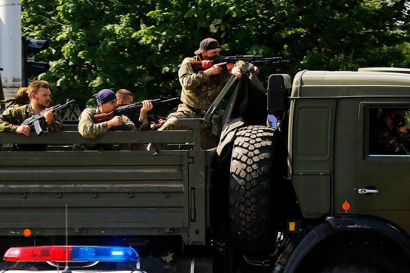 articles/2014/05/27/war-and-murder-in-eastern-ukraine/140527-nemtsova-ukraine-tease_uh9lbb