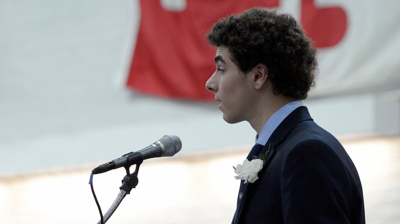 Valedictorian Luigi Mangione gives a farewell speech to the Class of 2016 during commencement at Gilman School.