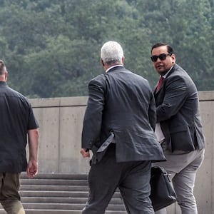 Rep. George Santos on the steps of the federal courthouse in Central Islip, NY.