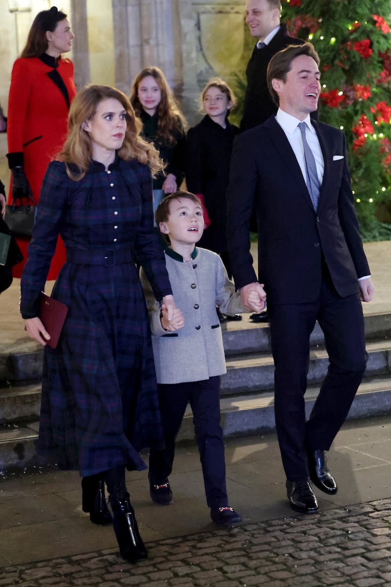 (l to r) Princess Beatrice, Christopher Woolf and Edoardo Mapelli Mozzi attend the "Together At Christmas" Carol Service at Westminster Abbey on December 08, 2023 in London, Britain.