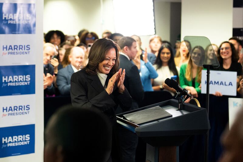 U.S. Vice President Kamala Harris smiles as she speaks at her Presidential Campaign headquarters in Wilmington