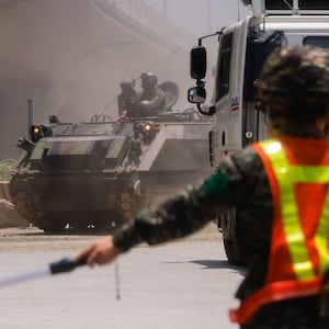 An armored vehicle passes during a drill in New Taipei City, Taiwan.