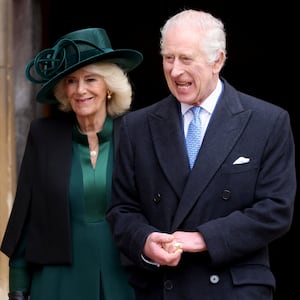 Queen Camilla, left, and King Charles leave after attending the Easter Matins Service at St. George's Chapel, Windsor Castle, March 31, 2024.