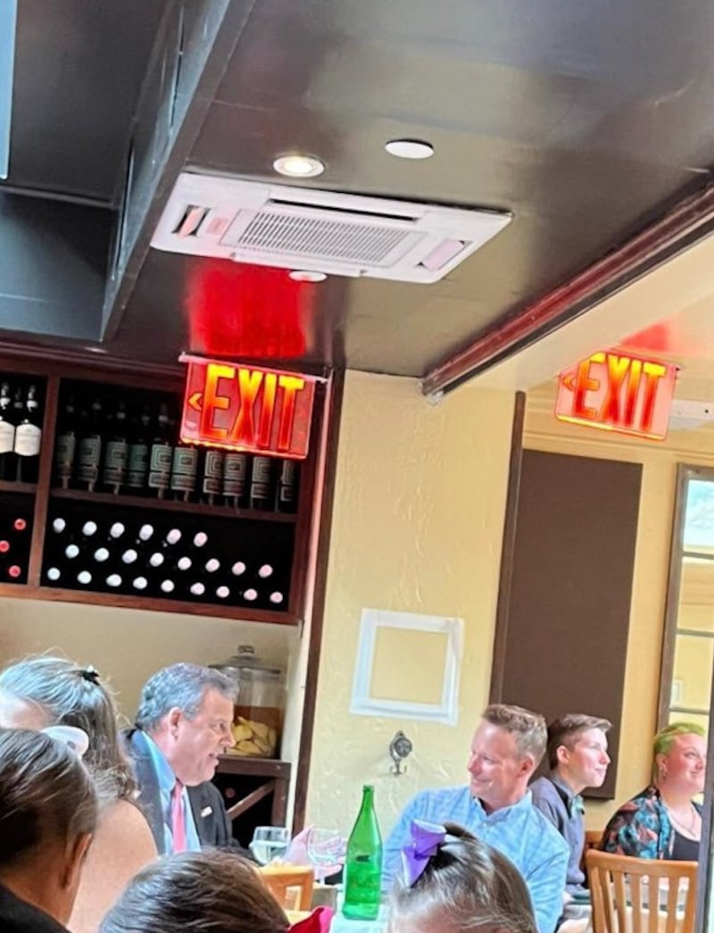 Chris Christie and Chris Licht dining at Becco in New York City.