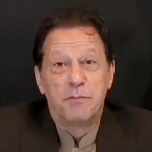 Imran Khan appearing to talk to the camera in an AI video.