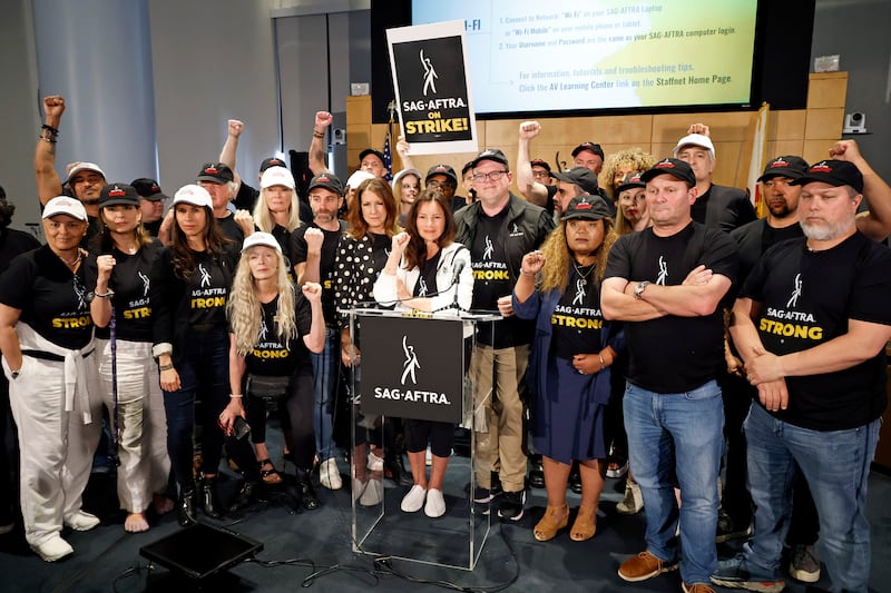 A photo including Frances Fisher, Ben Whitehair, Joely Fisher, SAG President Fran Drescher, National Executive Director and Chief Negotiator of SAG-AFTRA Duncan Crabtree-Ireland, Michael Gaston, and Michelle Hurd.