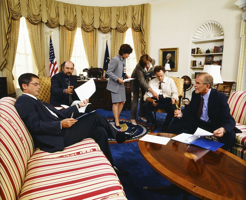 Rob Lowe, Richard Schiff, Moira Kelly, Allison Janney, Bradley Whitford, John Spencer as Leo McGarry on The West Wing.