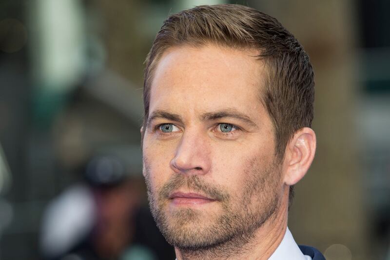 articles/2013/11/30/actor-paul-walker-star-of-the-fast-and-the-furious-films-dies-in-car-crash/131130-stern-walker-tease_wz31dg