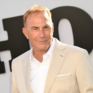 A photo of Kevin Costner on a red carpet