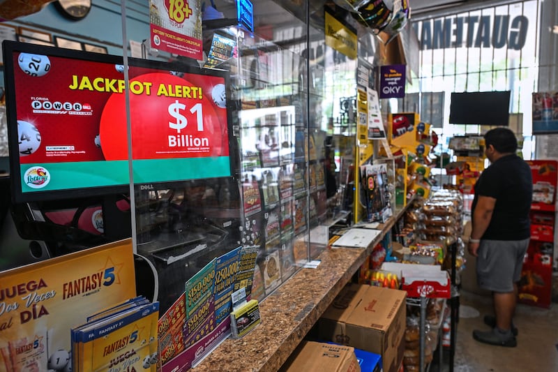 A picture of someone buying a lottery ticket at a store in Homestead, Florida. 