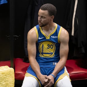 A photo still of Adam Pally and Stephen Curry