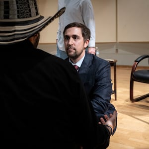 Conservative activist Christopher Rufo, right, talks to Assistant Professor of Theater and Performance Studies Diego Villada on the campus of New College of Florida in Sarasota, Fla.