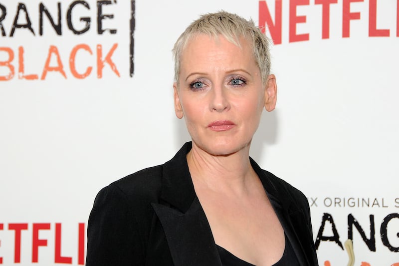 articles/2014/06/08/lori-petty-on-orange-is-the-new-black-the-halcyon-90s-and-discovering-jennifer-lawrence/140608-lori-petty-oitnb-tease_xcs79v