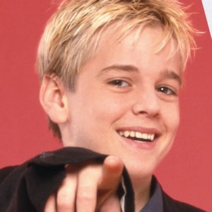 Side-by-side image of Aaron Carter young/and current photo.