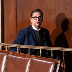 Rep. George Santos walks through the House chamber before the start of the 7th failed attempt to elect a speaker in the Capitol on Thursday, January 5, 2023.