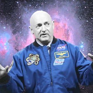 black and white image of mark kelly in nasa astronaut uniform with universe of stars behind him gabby giffords john mccain democrat arizona space force climate change environment