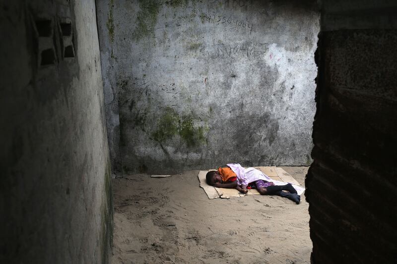 galleries/2014/08/21/violence-and-chaos-ensue-as-panic-spreads-in-liberia-photos/140821-ebola-liberia-9_eqyauz