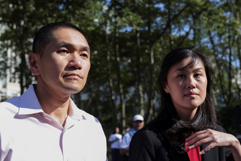 Linda Sun, a former aide to New York State Governor Kathy Hochul, exits Brooklyn Federal court accompanied by Chris Hu.