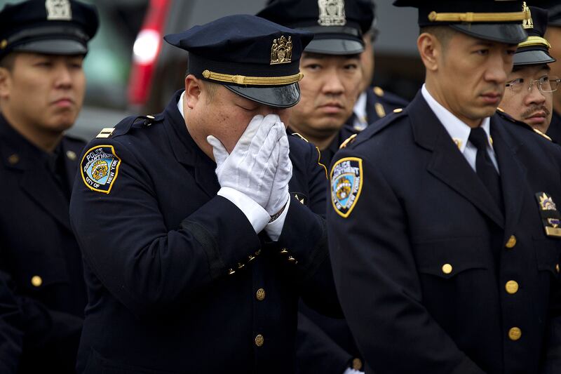 galleries/2015/01/04/nypd-remembers-slain-officer-wenjian-liu-photos/150104-lui-funeral7_sbjqvu