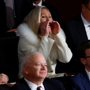 Rep. Marjorie Taylor Greene (R-GA) yells at U.S. President Joe Biden as he delivers his State of the Union address at the U.S. Capitol in Washington, DC. 