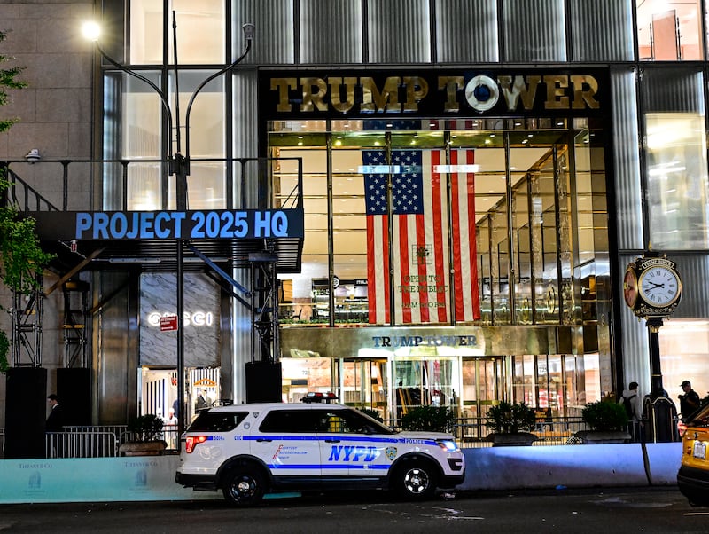 The Democratic National Committee projects messages on Trump Tower on the eve of the vice presidential debate on September 30, 2024 in New York City.  