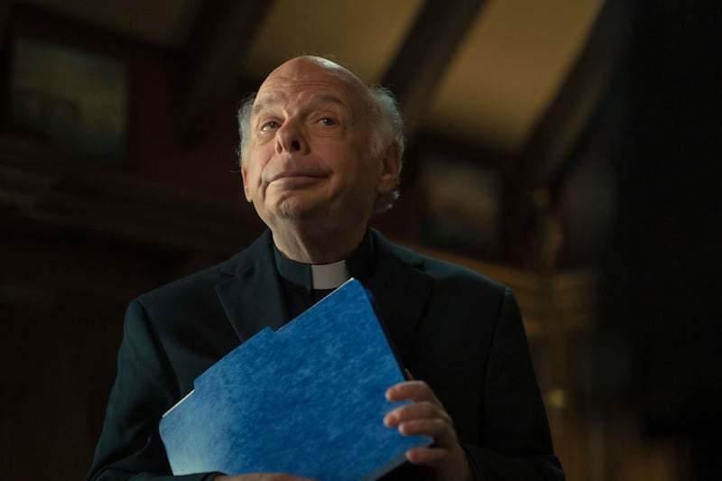 A photo still of Wallace Shawn