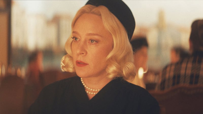 A close up shot of Chloe Sevigny in a still from ‘Feud: Capote vs The Swans’