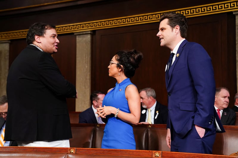 Former Republican Representative from New York George Santos chats with Republican Representative from Colorado Lauren Boebert and Republican Representative from Florida Matt Gaetz ahead of US President Joe Biden's third State of the Union address to a joint session of Congress in the US Capitol in Washington, DC, USA, 07 March 2024.     SHAWN THEW/Pool via REUTERS