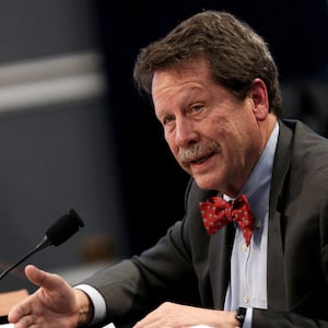 Robert Califf speaks into a microphone.