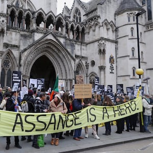 WikiLeaks founder Julian Assange’s supporters stand outside the High Court on Feb. 20, when he was too sick to attend a hearing.