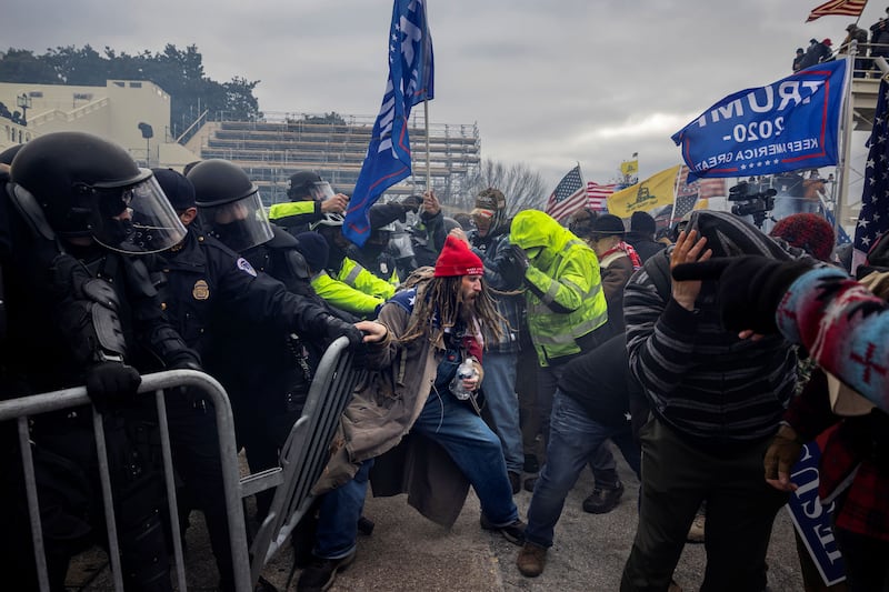 Trump supporters clash with police and security forces as people try to storm the US Capitol on January 6, 2021 in Washington, DC