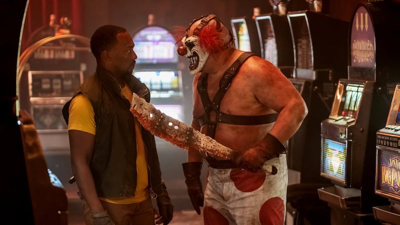 Photo of Anthony Mackie as John Doe and Joe Seanoa as Sweet Tooth in Peacock's Twisted Metal