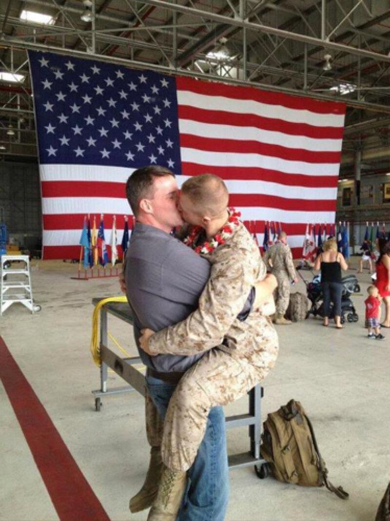 articles/2012/02/28/gay-marine-homecoming-kiss-between-sgt-brandon-morgan-boyfriend-dalan-wells-photo/gay-marine-homecoming-kiss-tdb_k5bojg