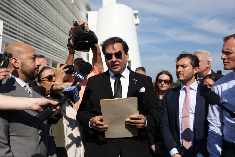 Former U.S. Rep. George Santos gives a statement after a court hearing on August 19, 2024 in West Islip, New York.