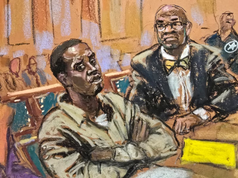 Sean "Diddy" Combs listens accompanied by attorney Anthony Ricco, on the day of his hearing on his request to be released from jail pending trial in New York City, U.S., November 22, 2024 in this courtroom sketch.